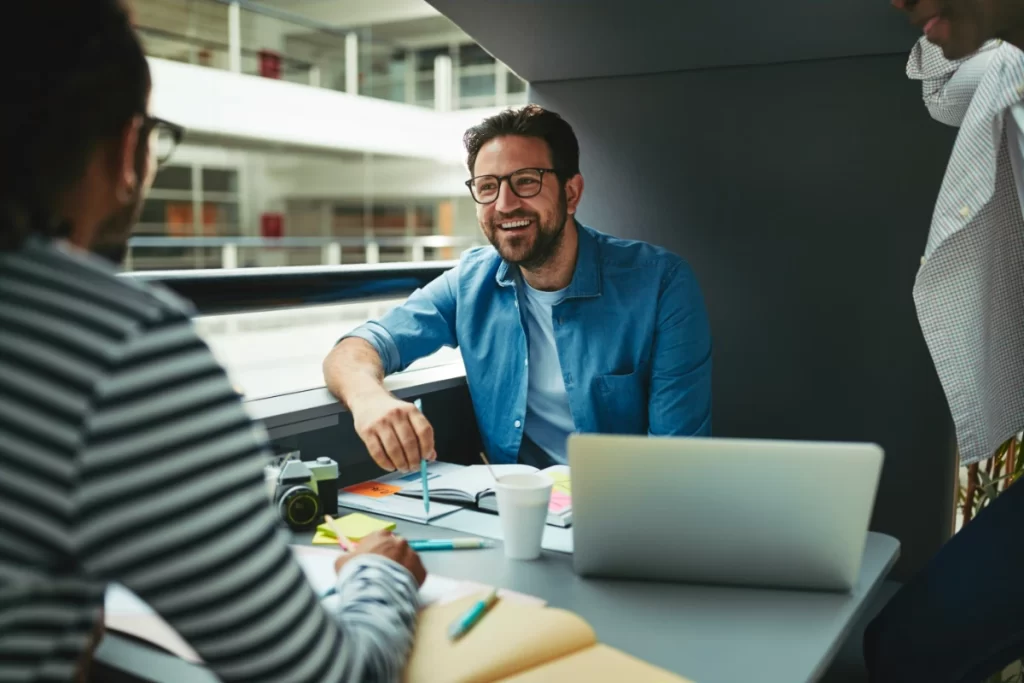 High earning executive speaks with his tax advisor